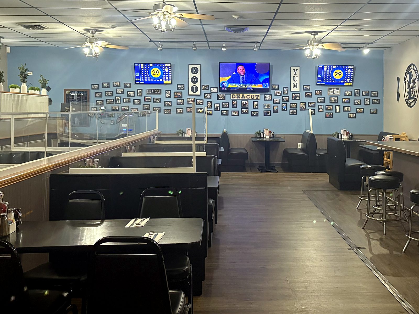 The front room with the counter and the photo wall